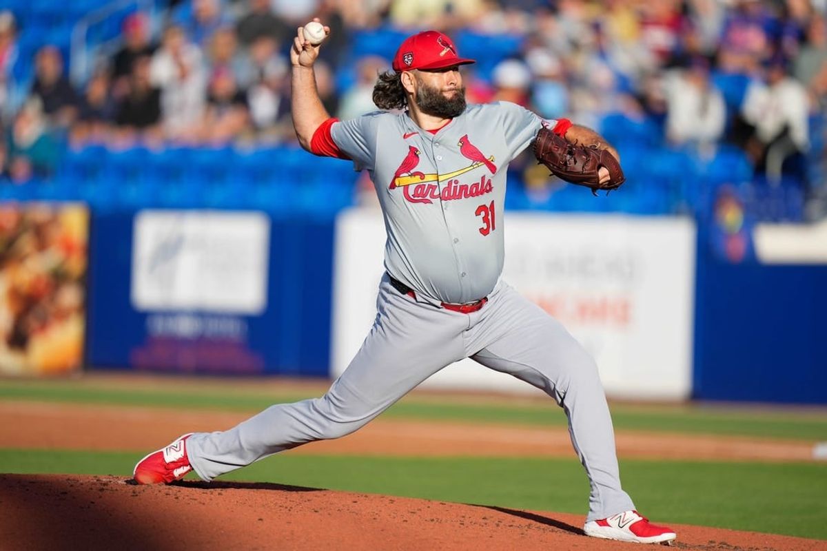 Mar 19, 2024; Port St. Lucie, Florida, USA; St. Louis Cardinals starting pitcher Lance Lynn (31) throws a pitch against the New York Mets during the first inning at Clover Park.
