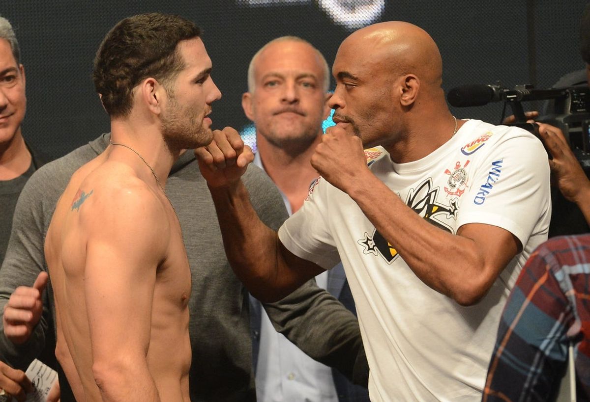 Dec 27, 2013; Las Vegas, NV, USA;    Chris Weidman and Anderson Silva face off at the weigh-in for their UFC Middleweight Title Fight at MGM Grand Garden Arena. Mandatory Credit: Jayne Kamin-Oncea-Imagn Images