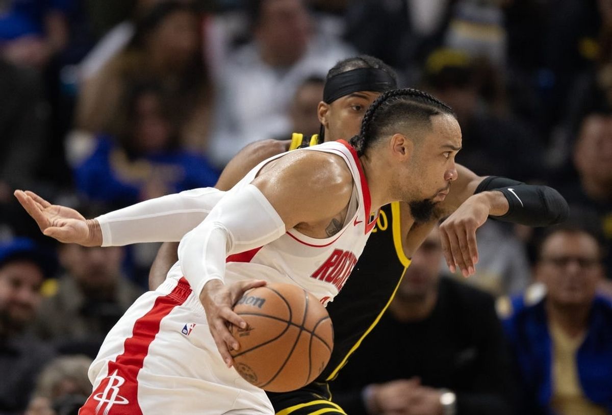 Nov 20, 2023; San Francisco, California, USA; Houston Rockets guard Dillon Brooks (9) drives around Golden State Warriors guard Moses Moody (4) during the first quarter at Chase Center.