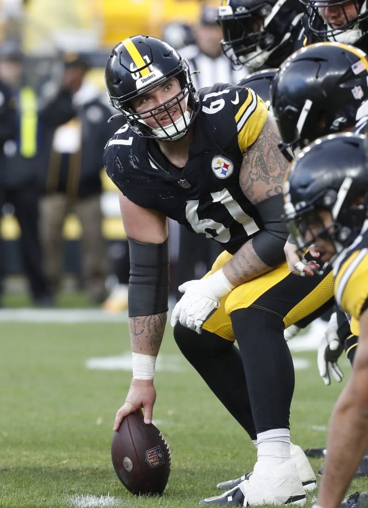 Dec 3, 2023; Pittsburgh, Pennsylvania, USA; Pittsburgh Steelers center Mason Cole (61) looks down the line of scrimmage against the Arizona Cardinals during the third quarter at Acrisure Stadium.