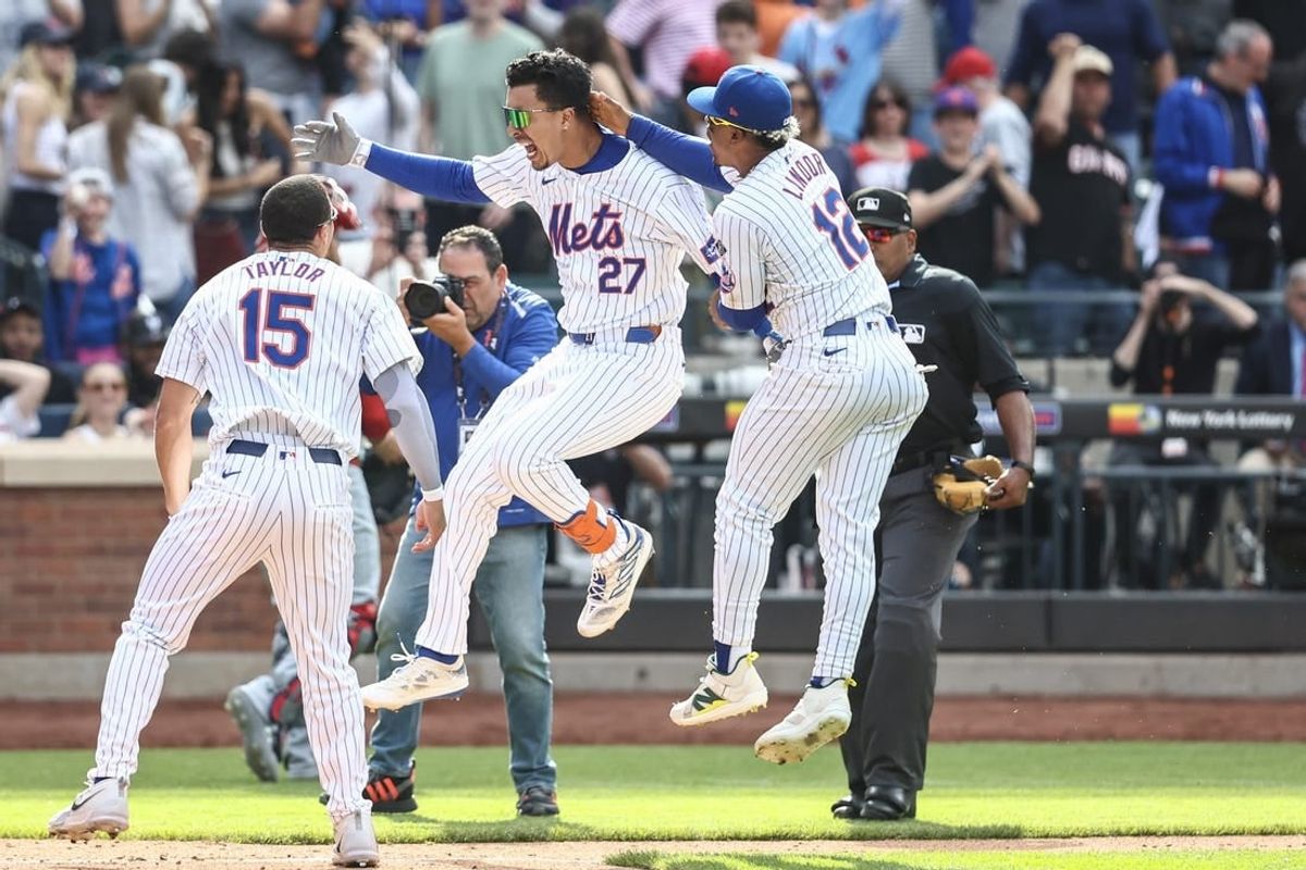 Apr 28, 2024; New York City, New York, USA;  New York Mets third baseman Mark Vientos (27) celebrates after hitting a game wining two run home run in the bottom of the 11th inning to defeat the St. Louis Cardinals 4-2 at Citi Field.