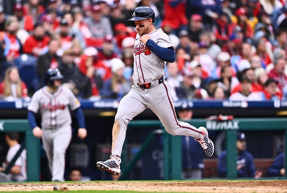 Mar 30, 2024; Philadelphia, Pennsylvania, USA; Atlanta Braves outfielder Jarred Kelenic (24) scores against the Philadelphia Phillies in the sixth inning at Citizens Bank Park.