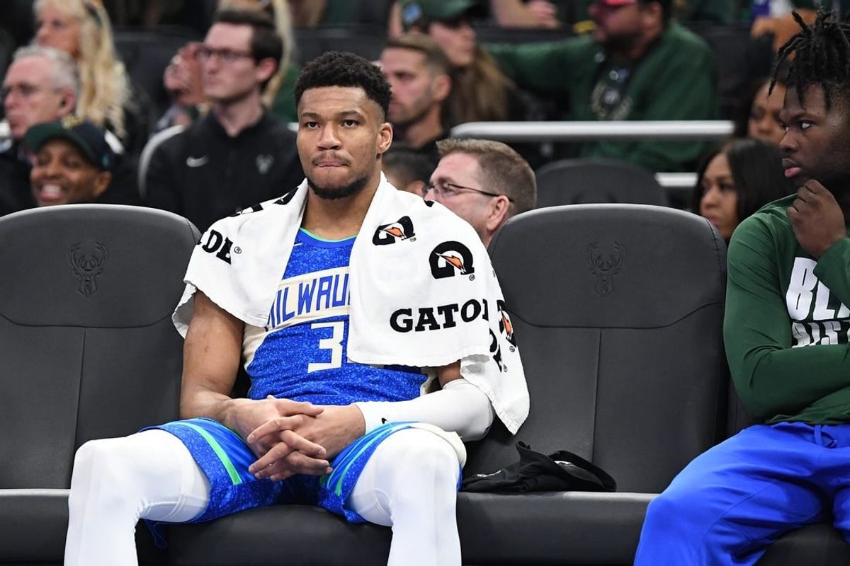 Feb 13, 2024; Milwaukee, Wisconsin, USA; Milwaukee Bucks forward Giannis Antetokounmpo (34) sits on the bench in the second half against the Miami Heat as he watches his team get beat 123-97 at Fiserv Forum.