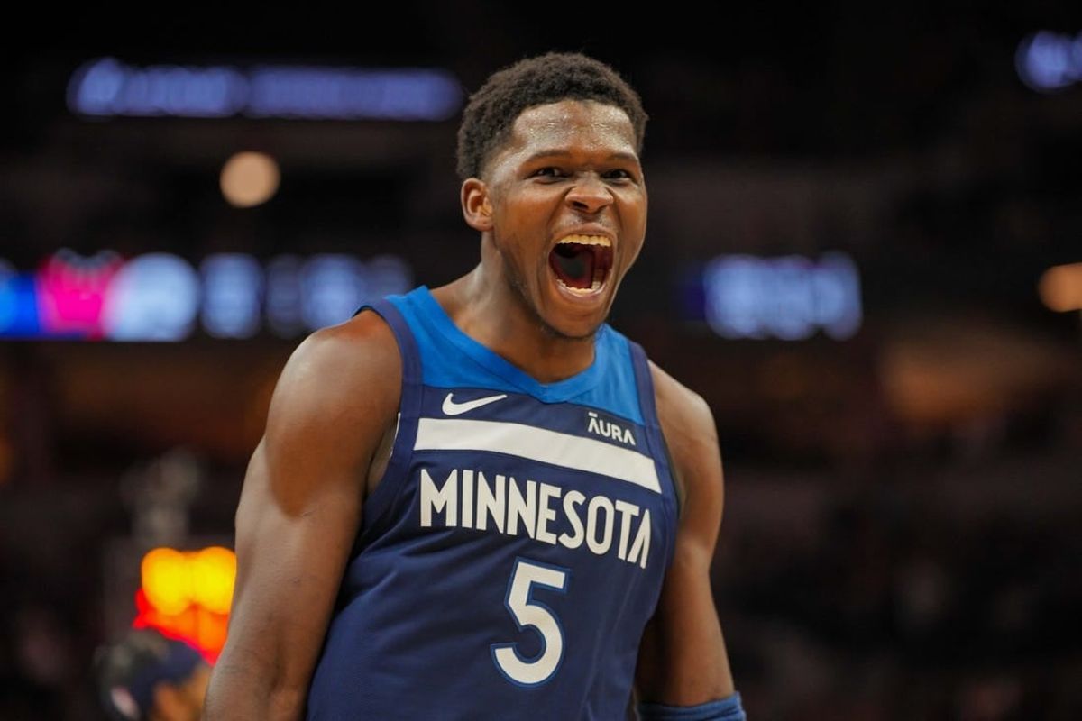 Nov 22, 2023; Minneapolis, Minnesota, USA; Minnesota Timberwolves guard Anthony Edwards (5) celebrates his basket against the Philadelphia 76ers in the third quarter at Target Center.