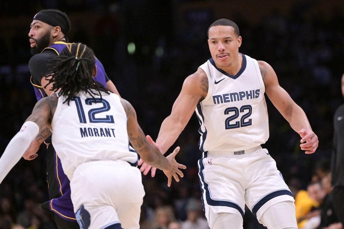 Jan 5, 2024; Los Angeles, California, USA; Memphis Grizzlies guard Desmond Bane (22) is congratulated by guard Ja Morant (12) after a three-point basket in the second half against the Los Angeles Lakers at Crypto.com Arena.