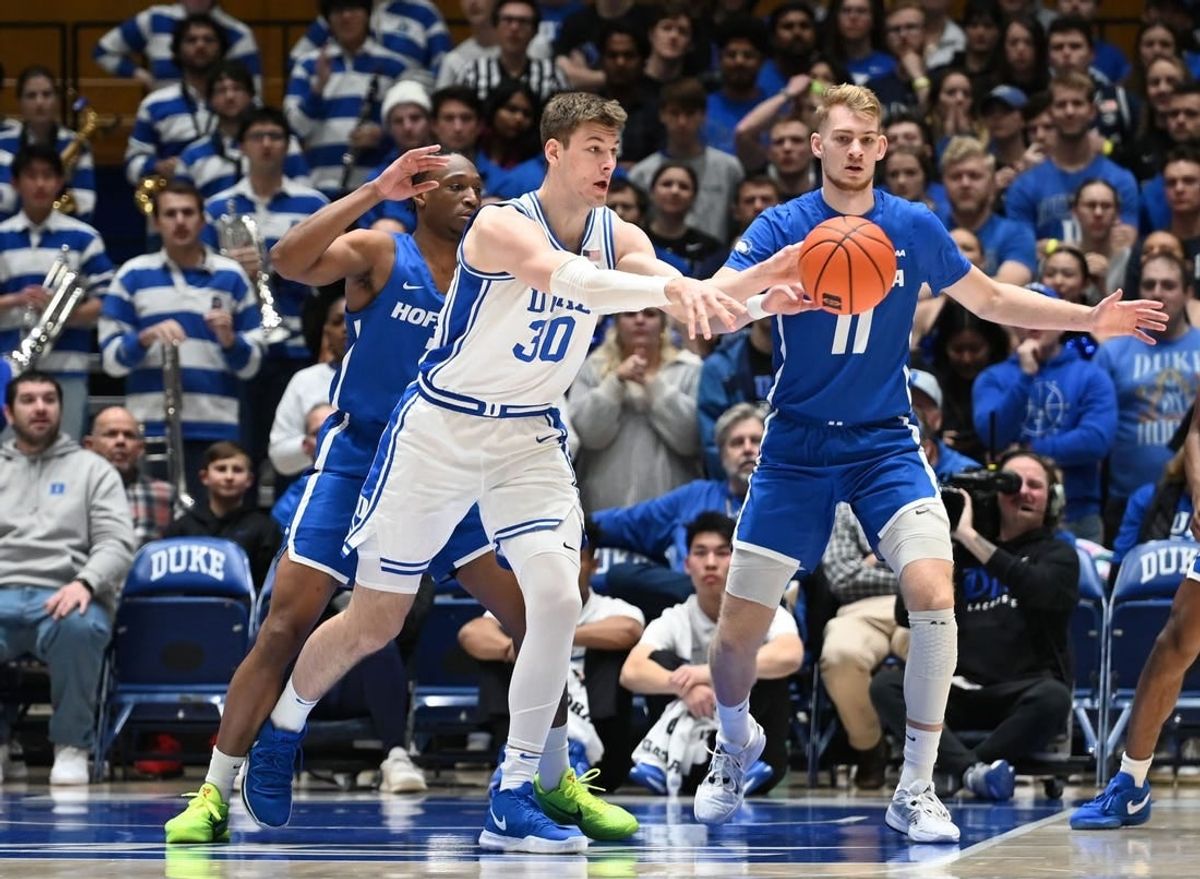 Dec 12, 2023; Durham, North Carolina, USA; Duke Blue Devils center Kyle Filipowski (30) throws a pass during the first half against the Hofstra Bison at Cameron Indoor Stadium.