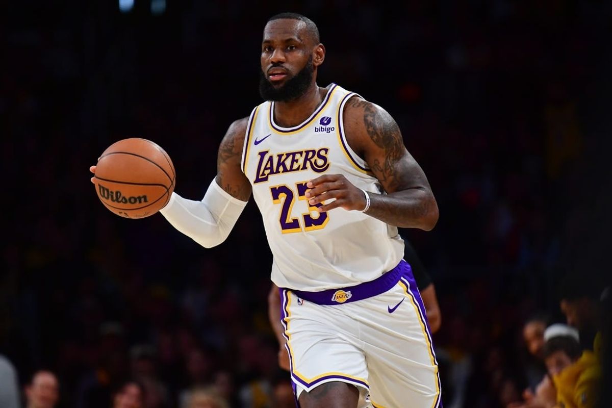 Dec 2, 2023; Los Angeles, California, USA; Los Angeles Lakers forward LeBron James (23) controls the ball against the Houston Rockets during the first half at Crypto.com Arena.