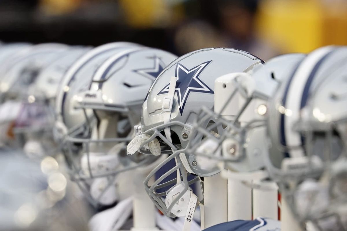Jan 7, 2024; Landover, Maryland, USA; A view of Dallas Cowboys players' helmets on the bench against the Washington Commanders during the first quarter at FedExField.