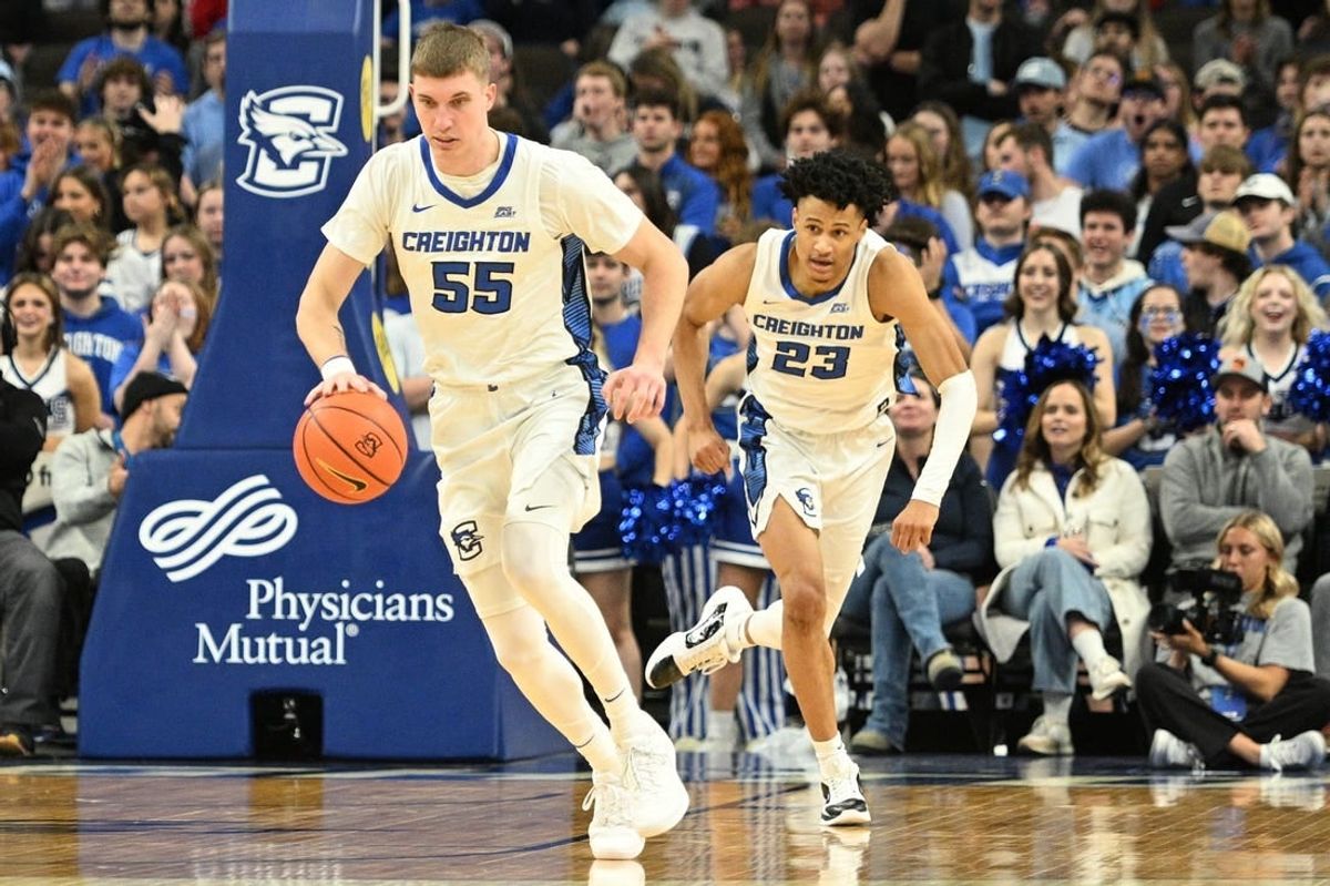 Dec 9, 2023; Omaha, Nebraska, USA;  Creighton Bluejays guard Baylor Scheierman (55) dribbles up the court with guard Trey Alexander (23) in the second half against the Central Michigan Chippewas at CHI Health Center Omaha.