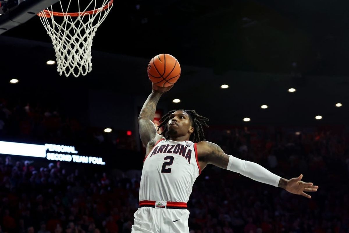 Dec 2, 2023; Tucson, Arizona, USA; Arizona Wildcats guard Caleb Love (2) dunks the ball against the Colgate Raiders during the second half at McKale Center.