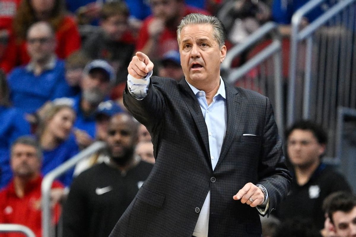 Dec 21, 2023; Louisville, Kentucky, USA;  Kentucky Wildcats head coach John Calipari gives instruction during the second half against the Louisville Cardinals at KFC Yum! Center. Kentucky defeated Louisville 95-76.