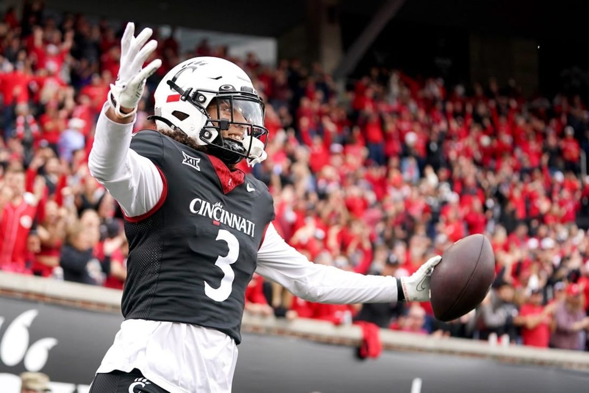 Oct 21, 2023; Cincinnati, Ohio, USA; Cincinnati Bearcats wide receiver Evan Prater (3) scores on a two-point conversion from quarterback Emory Jones (not pictured) against the Baylor Bears in the fourth quarter at Nippert Stadium.