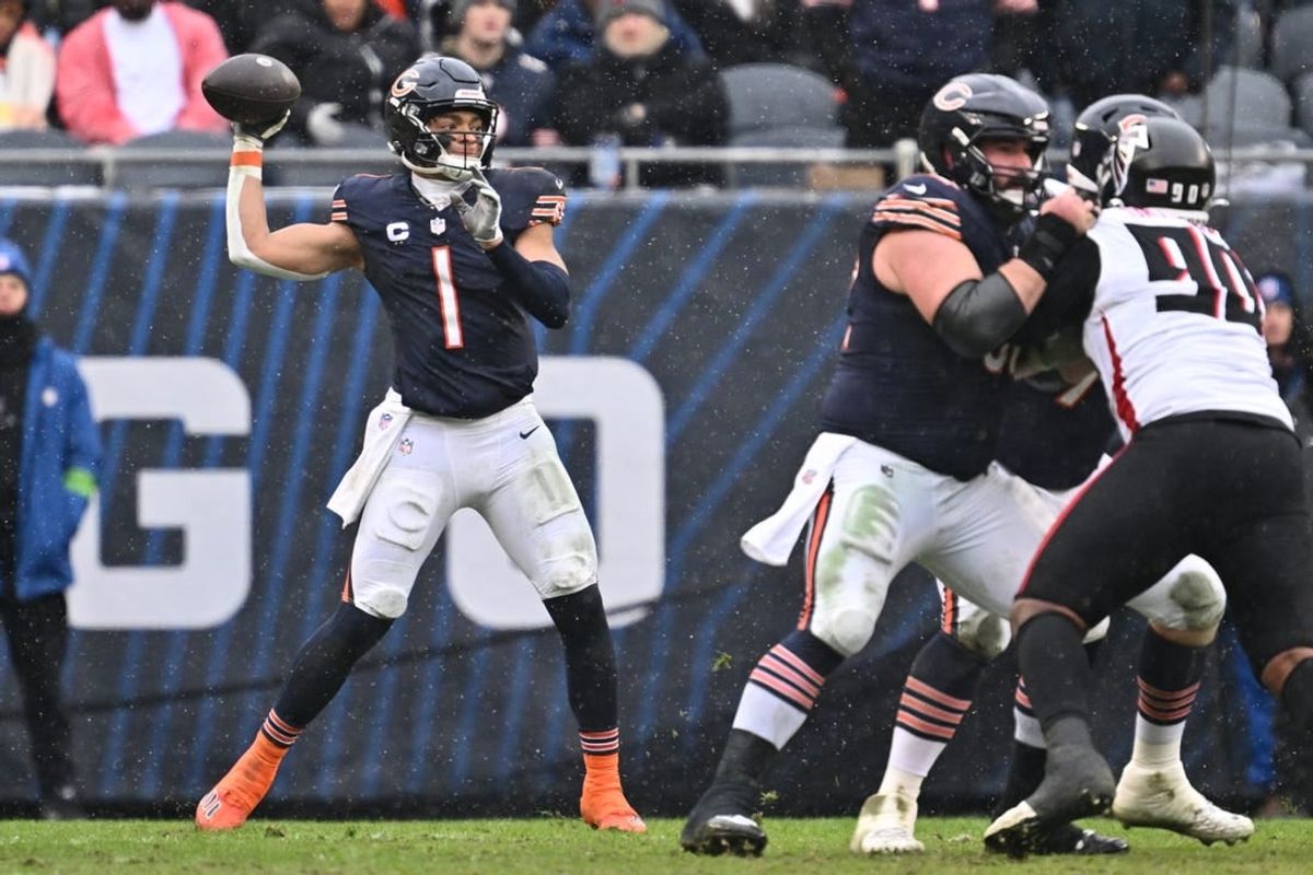 Dec 31, 2023; Chicago, Illinois, USA;  Chicago Bears quarterback Justin Fields (1) passes in the first half against the Atlanta Falcons at Soldier Field.