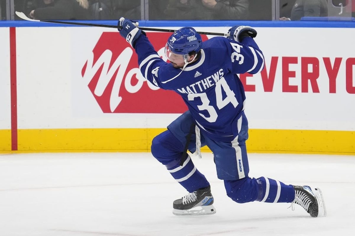 Feb 13, 2024; Toronto, Ontario, CAN; Toronto Maple Leafs forward Auston Matthews (34) shoots the puck during warm up before a game against the St. Louis Blues at Scotiabank Arena.