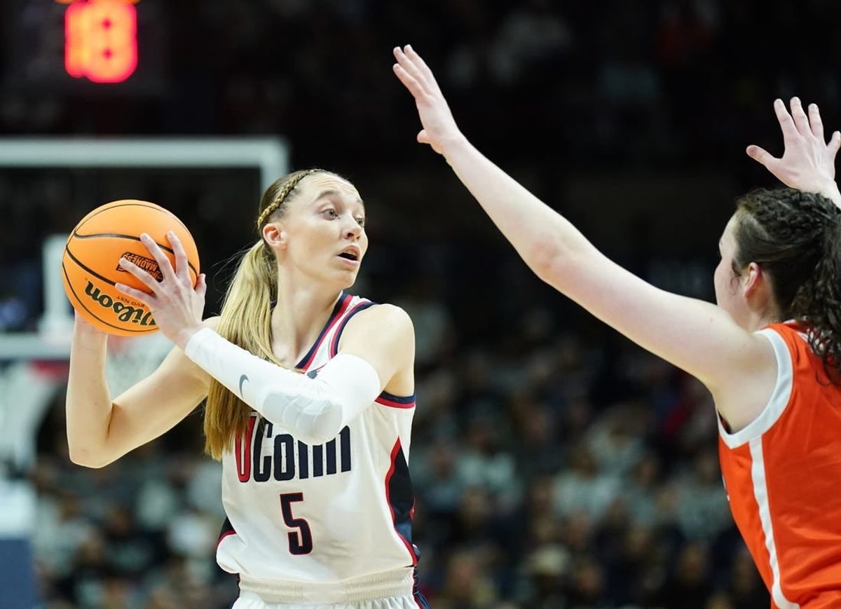 Mar 25, 2024; Storrs, Connecticut, USA; UConn Huskies guard Paige Bueckers (5) looks for an opening against the Syracuse Orange in the first half at Harry A. Gampel Pavilion.