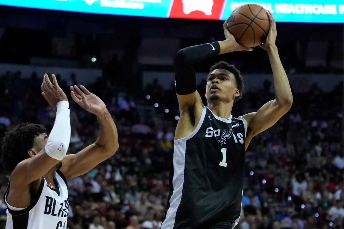 Victor Wembanyama shoots over Portland Trail Blazers’ Justin Minaya