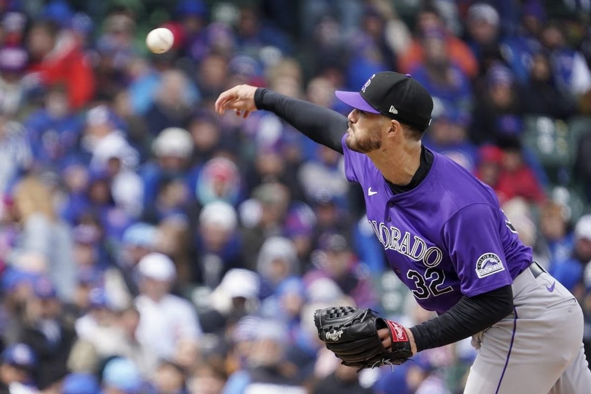 Apr 1, 2024; Chicago, Illinois, USA; Colorado Rockies starting pitcher Dakota Hudson (32) pitches against the Chicago Cubs during the third inning at Wrigley Field.