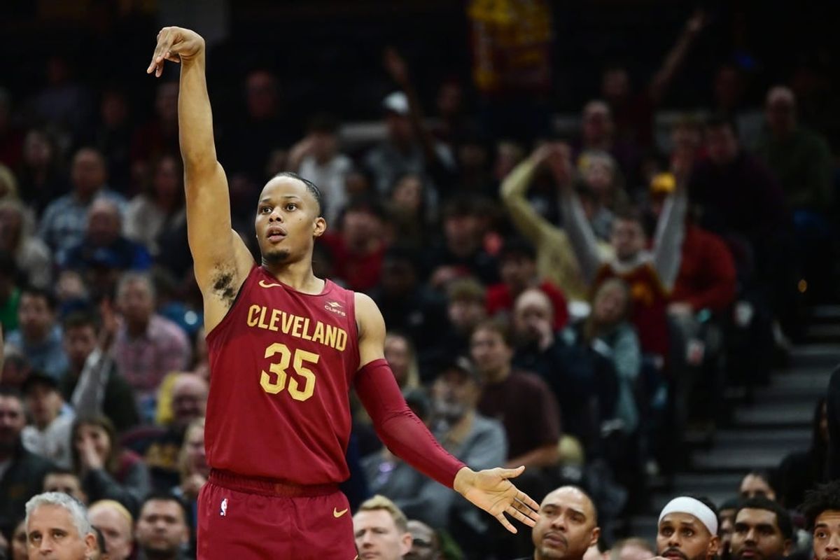 Dec 16, 2023; Cleveland, Ohio, USA; Cleveland Cavaliers forward Isaac Okoro (35) hits a three point basket during the second half against the Atlanta Hawks at Rocket Mortgage FieldHouse.