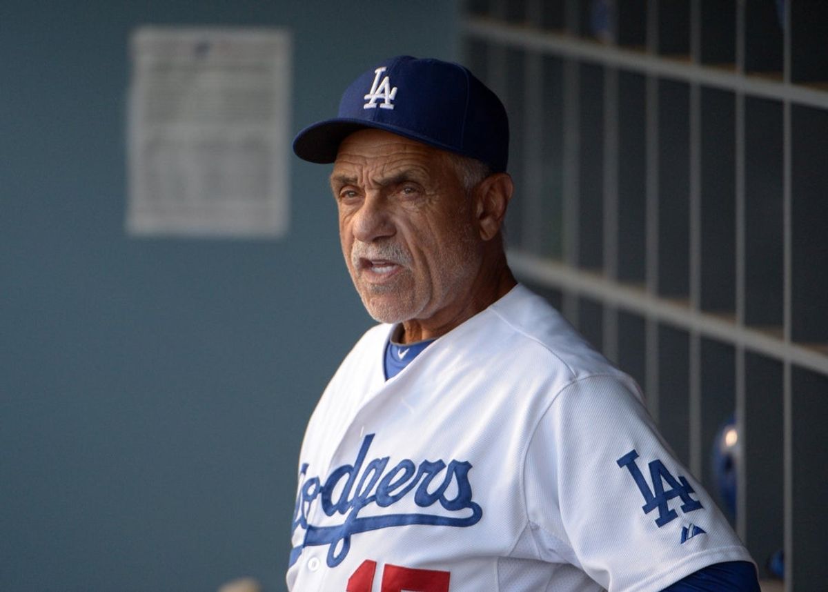 Jul 11, 2014; Los Angeles, CA, USA; Los Angeles Dodgers first base coach Davey Lopes (15) during the game against the San Diego Padres at Dodger Stadium. Mandatory Credit: Kirby Lee-Imagn Images
