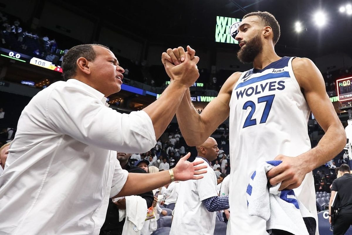 Apr 23, 2023; Minneapolis, Minnesota, USA; Minnesota Timberwolves center Rudy Gobert (27) and owner Alex Rodriguez celebrate after the win of game four of the 2023 NBA Playoffs against the Denver Nuggets at Target Center.