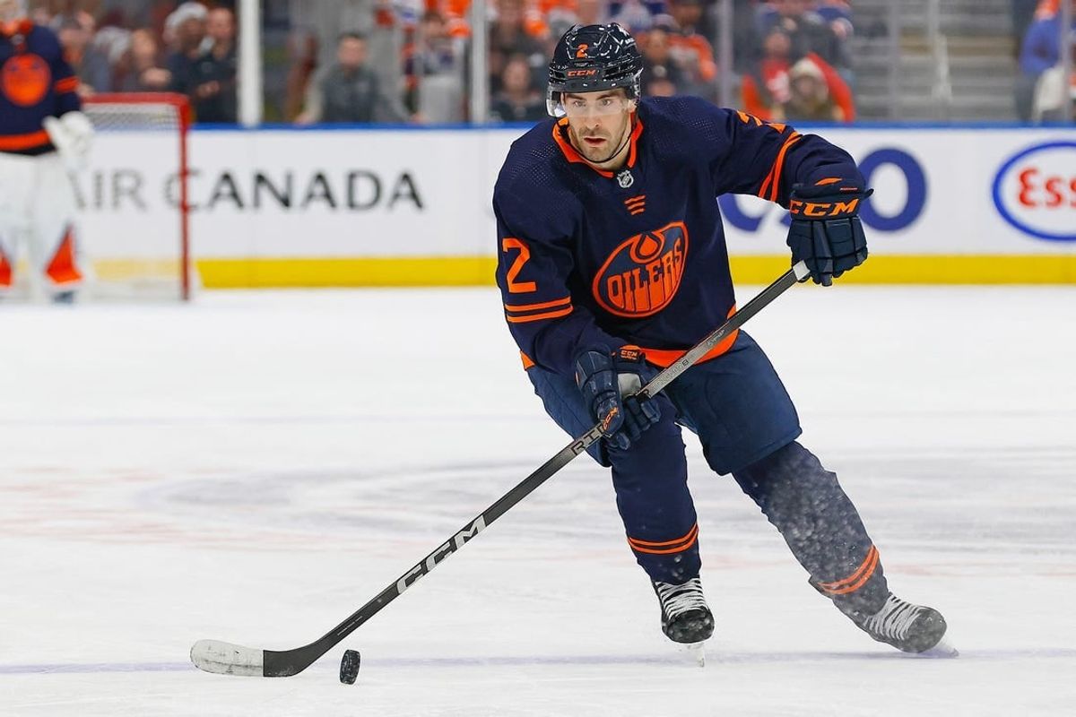 Dec 14, 2023; Edmonton, Alberta, CAN; Edmonton Oilers defensemen Evan Bouchard (2) makes a pass against the Tampa Bay Lightning at Rogers Place.