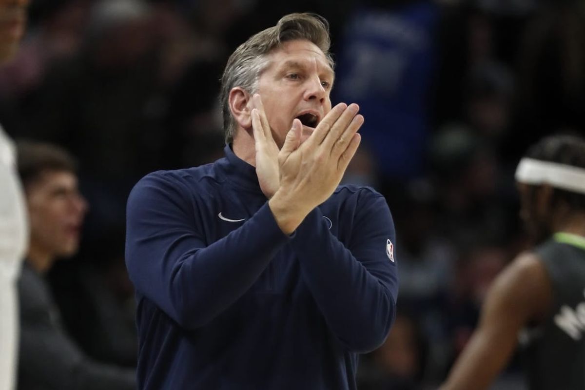 Jan 31, 2024; Minneapolis, Minnesota, USA; Minnesota Timberwolves head coach Chris Finch directs his team as they play the Dallas Mavericks in the first quarter at Target Center.