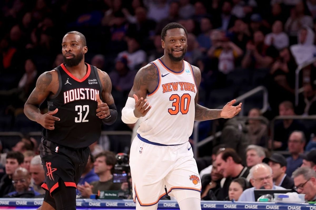 Jan 17, 2024; New York, New York, USA; New York Knicks forward Julius Randle (30) reacts after a basket against Houston Rockets forward Jeff Green (32) during the fourth quarter at Madison Square Garden.