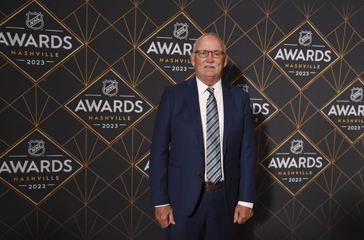 Jun 26, 2023; Nashville, Tennessee, USA; New Jersey Devils head coach Lindy Ruff arrives on the red carpet before the 2023 NHL Awards at Bridgestone Arena.