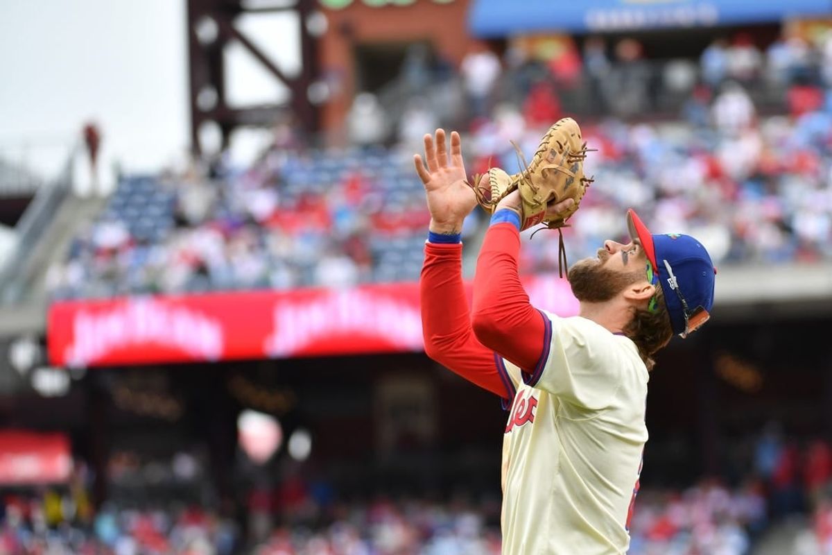 Apr 21, 2024; Philadelphia, Pennsylvania, USA; Philadelphia Phillies first base Bryce Harper (3) catches pop fly against the Chicago White Sox during the seventh inning at Citizens Bank Park.