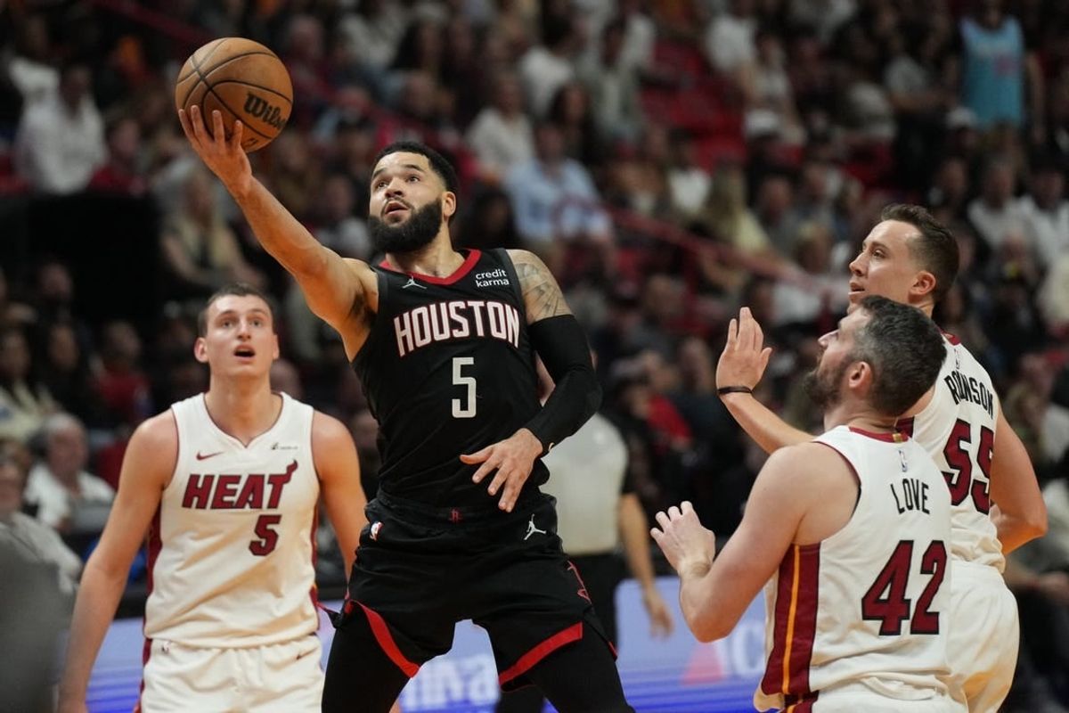 Jan 8, 2024; Miami, Florida, USA;  Houston Rockets guard Fred VanVleet (5) goes up for a shot against the Miami Heat during the second half at Kaseya Center.
