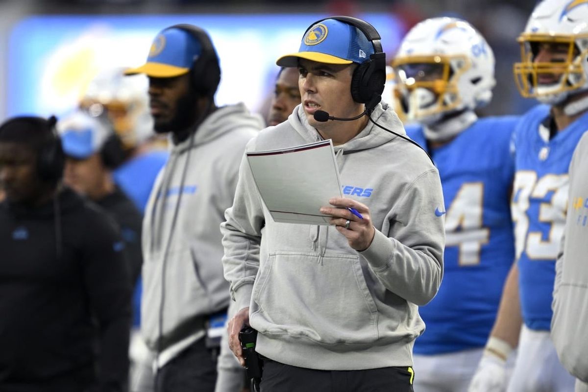 Jan 7, 2024; Inglewood, California, USA; Los Angeles Chargers offensive coordinator Kellen Moore looks on during the second half against the Kansas City Chiefs at SoFi Stadium.