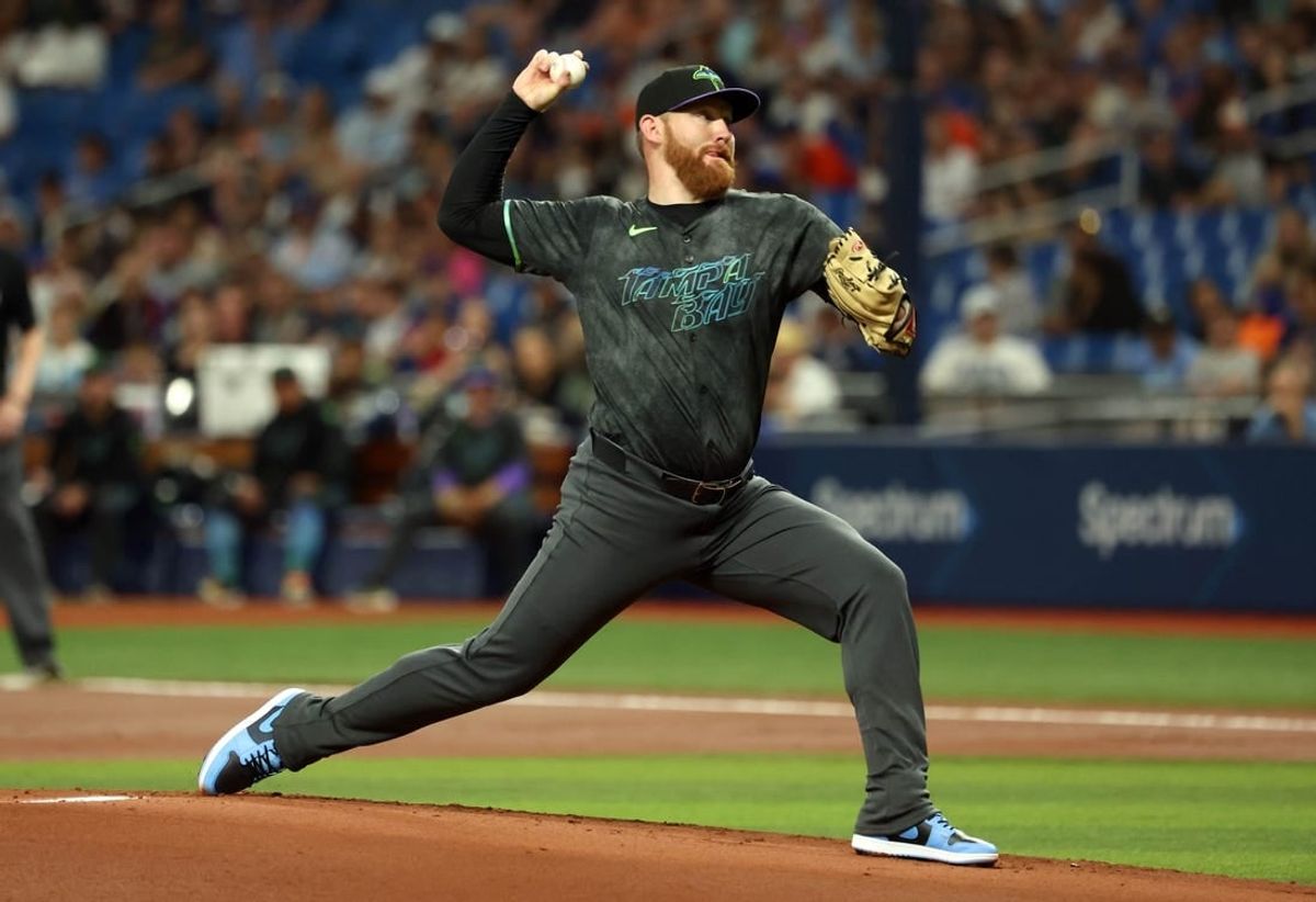 May 4, 2024; St. Petersburg, Florida, USA;  Tampa Bay Rays starting pitcher Zack Littlell (52) throws a pitch against the New York Mets during the first inning at Tropicana Field.