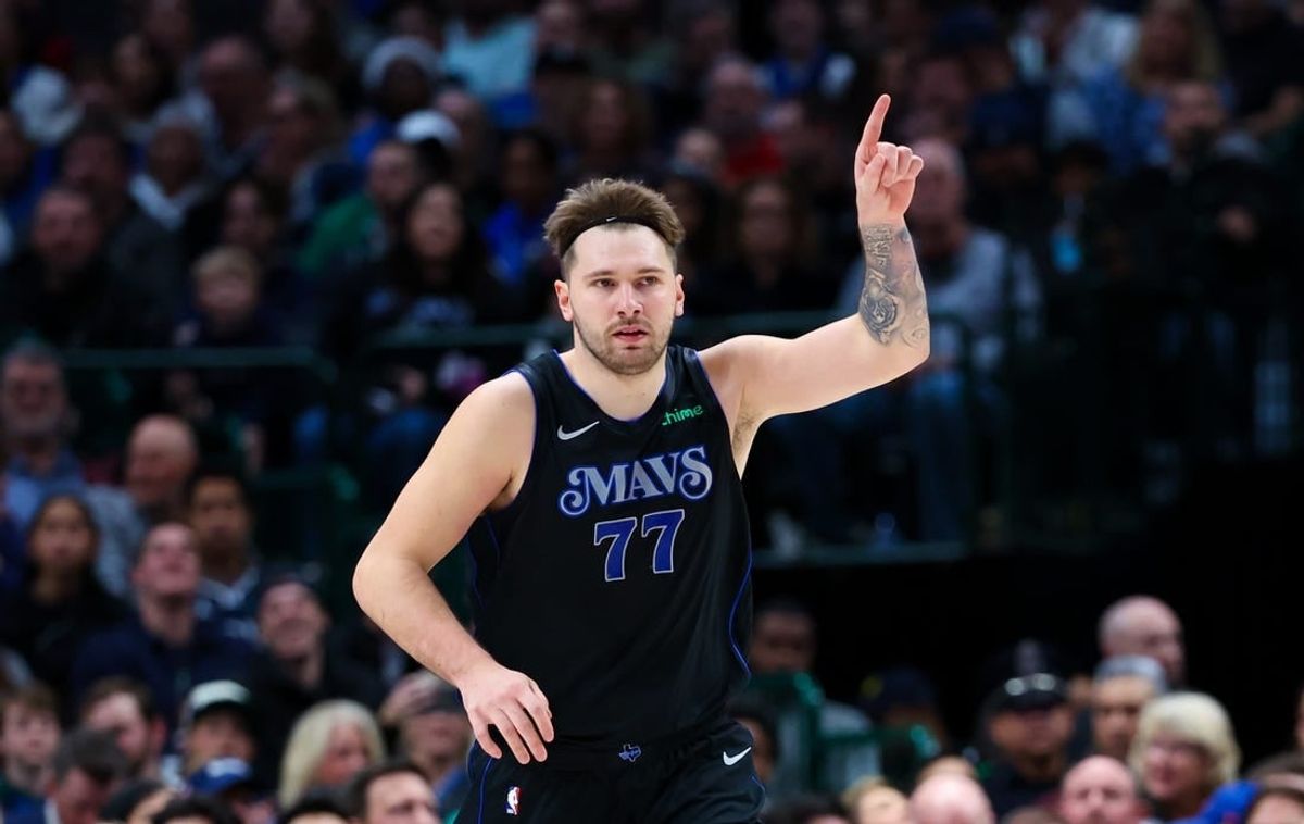 Dec 27, 2023; Dallas, Texas, USA;  Dallas Mavericks guard Luka Doncic (77) reacts after scoring during the first quarter against the Cleveland Cavaliers at American Airlines Center.