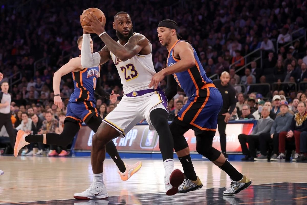 Feb 3, 2024; New York, New York, USA; Los Angeles Lakers forward LeBron James (23) drives to the basket against New York Knicks guard Josh Hart (3) during the first quarter at Madison Square Garden.