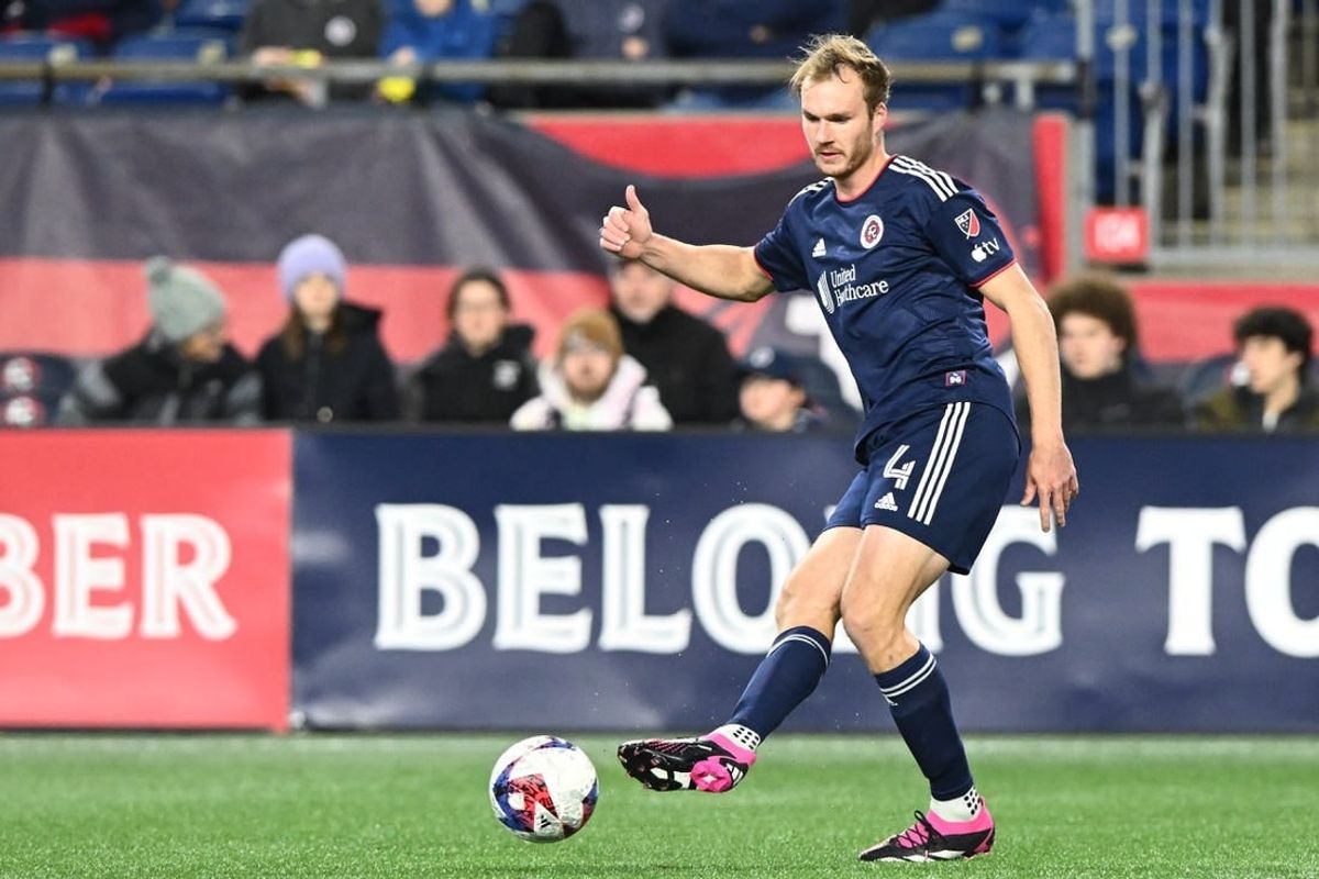 Mar 18, 2023; Foxborough, Massachusetts, USA; New England Revolution defender Henry Kessler (4) kicks the ball against the Nashville SC during the first half at Gillette Stadium.