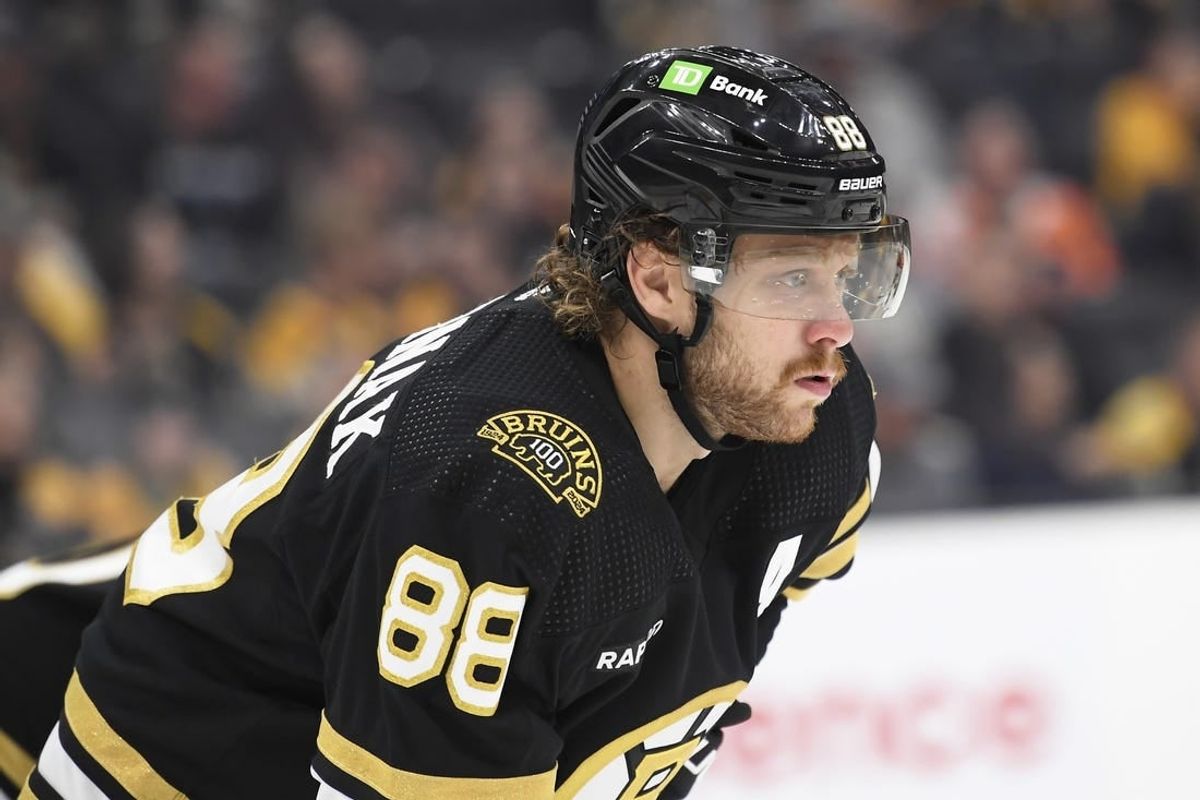 Sep 29, 2023; Boston, Massachusetts, USA;  Boston Bruins right wing David Pastrnak (88) gets ready for a face-off during the second period against the Philadelphia Flyers at TD Garden.
