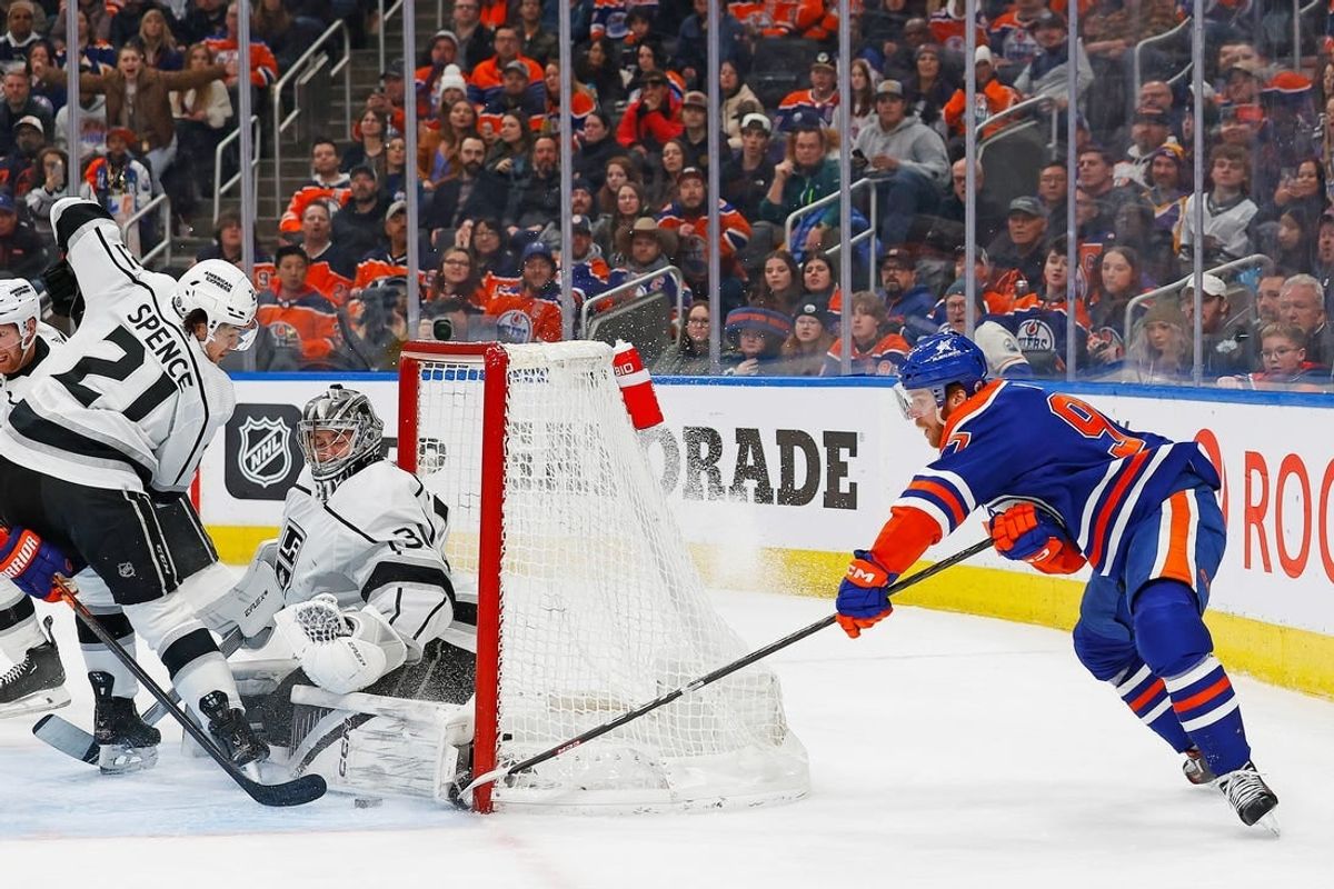 Feb 26, 2024; Edmonton, Alberta, CAN; Edmonton Oilers forward Connor McDavid (97) tries a wrap-around on Los Angeles Kings goaltender David Rittich (31) during the second period at Rogers Place.
