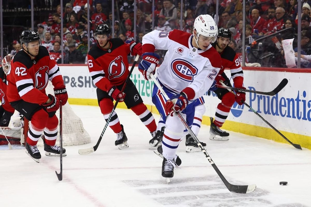 Jan 17, 2024; Newark, New Jersey, USA; Montreal Canadiens left wing Juraj Slafkovsky (20) skates with the puck against the Montreal Canadiens during the third period at Prudential Center.