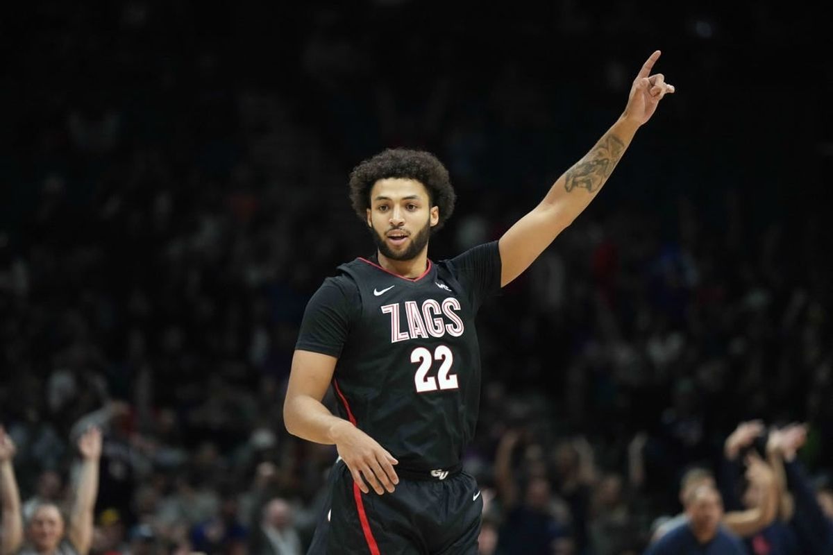 Dec 2, 2023; Las Vegas, Nevada, USA; Gonzaga Bulldogs forward Anton Watson (22) celebrates against the Southern California Trojans in the first half during the Legends of Basketball Las Vegas Invitational at MGM Grand Garden Arena.