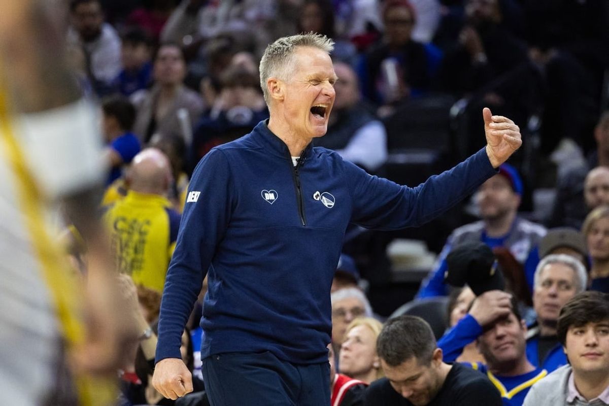 Feb 7, 2024; Philadelphia, Pennsylvania, USA; Golden State Warriors head coach Steve Kerr reacts after a score against the Philadelphia 76ers during the third quarter at Wells Fargo Center.