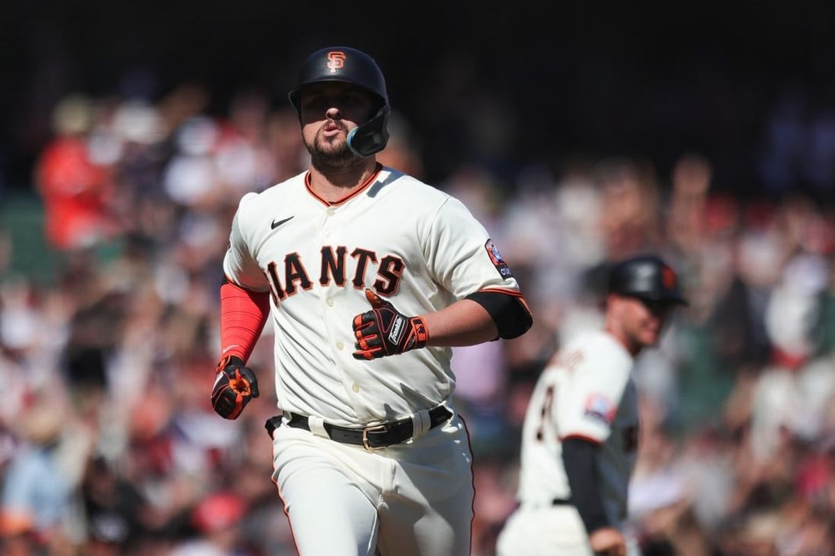 Sep 13, 2023; San Francisco, California, USA; San Francisco Giants third baseman J.D. Davis (7) reacts after hitting a three run home run during the eighth inning against the Cleveland Guardians at Oracle Park.