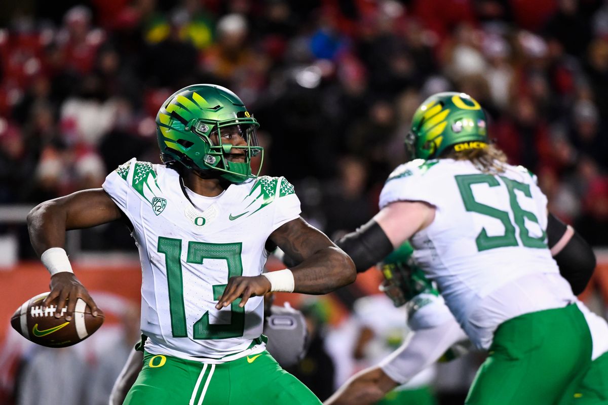 Oregon quarterback Anthony Brown looks for a pass during the first half of a game against Utah Saturday.