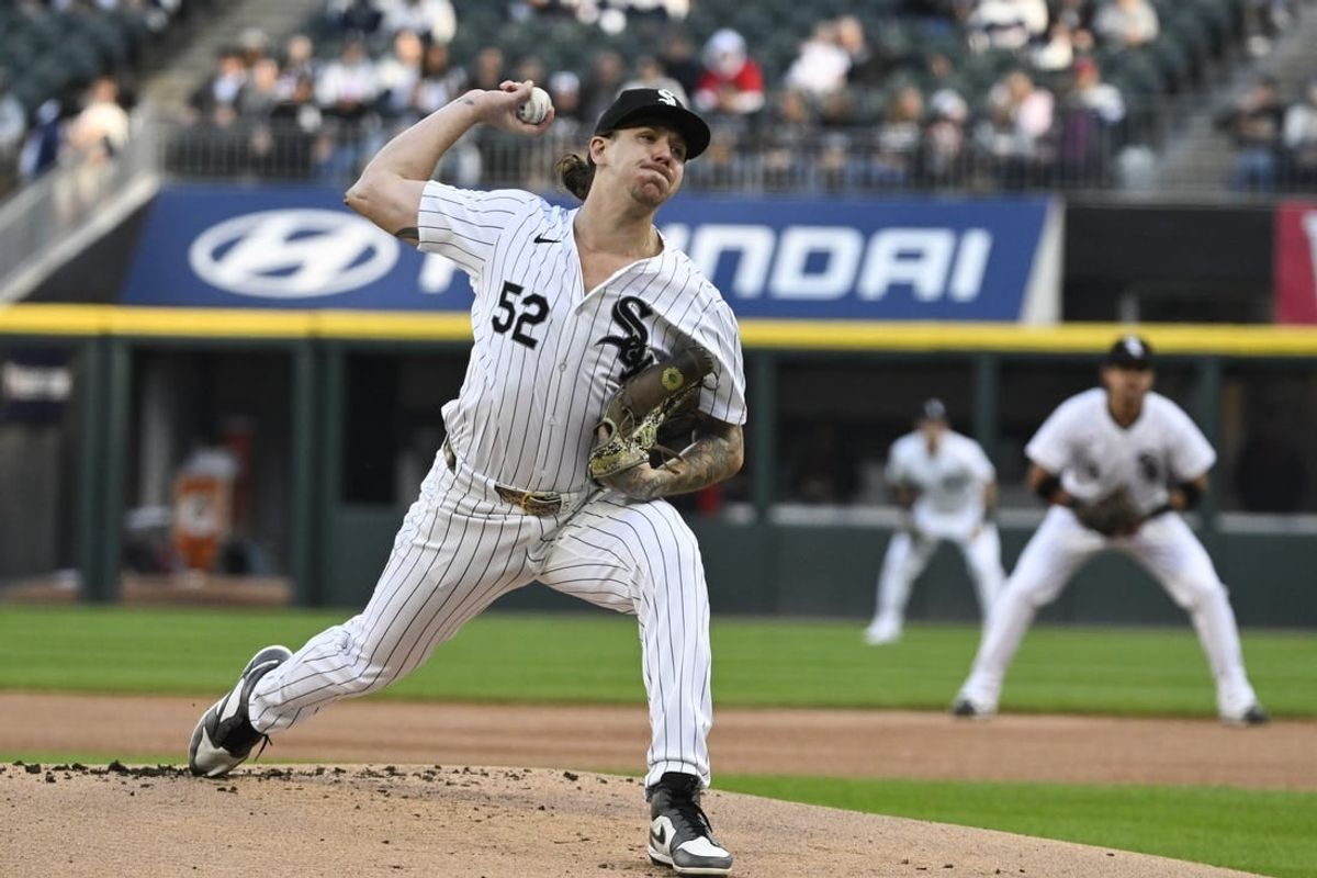 May 11, 2024; Chicago, Illinois, USA;  Chicago White Sox pitcher Mike Clevinger (52) delivers against the Cleveland Guardians during the first inning at Guaranteed Rate Field.