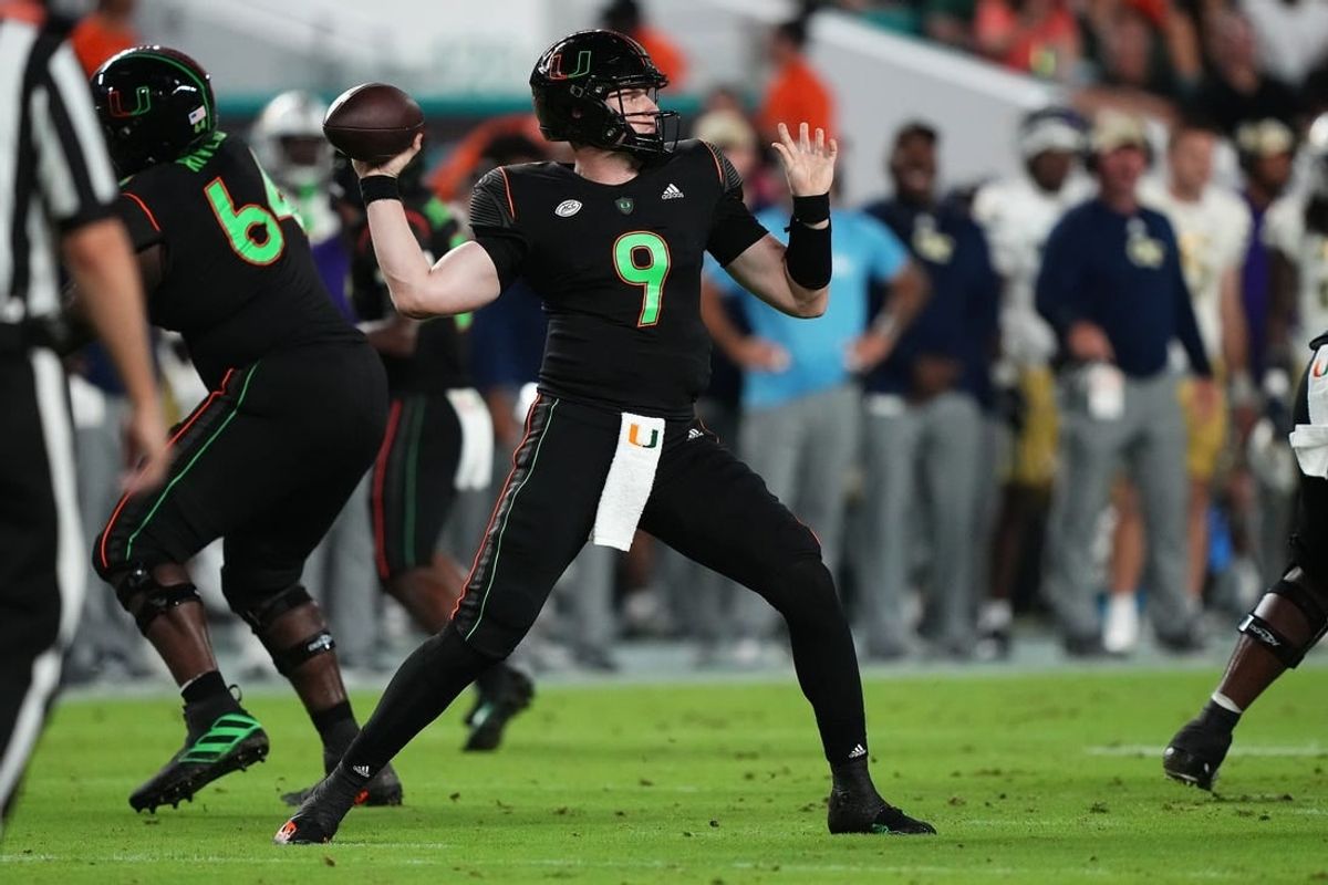 Oct 7, 2023; Miami Gardens, Florida, USA; Miami Hurricanes quarterback Tyler Van Dyke (9) attempts a pass against the Georgia Tech Yellow Jackets in the first half at Hard Rock Stadium.