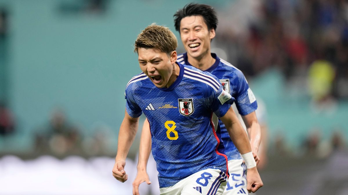 Japan’s Ritsu Doan celebrates after scoring his side’s opening goal during the World Cup group E soccer match between Germany and Japan, at the Khalifa International Stadium in Doha, Qatar,