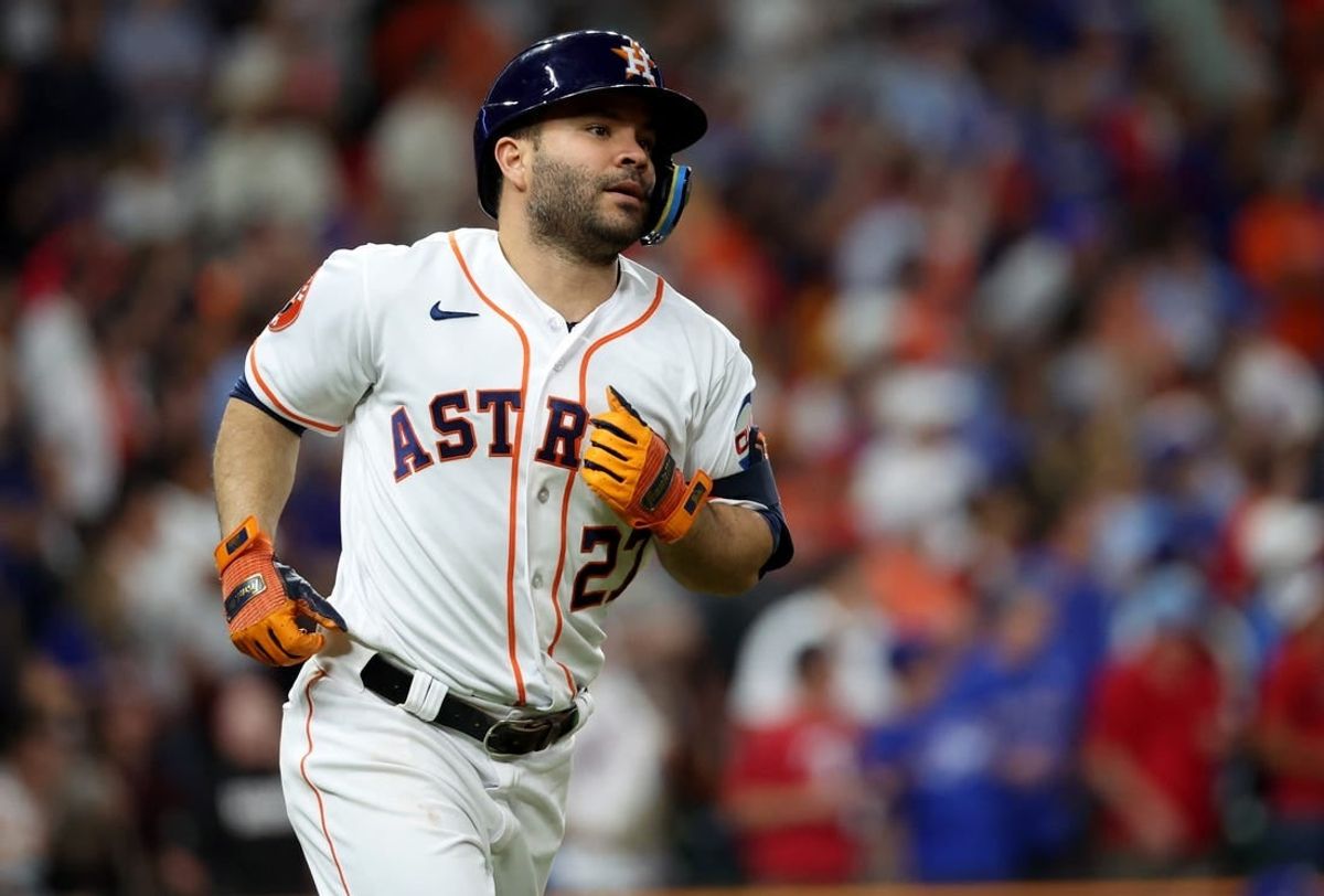Oct 23, 2023; Houston, Texas, USA; Houston Astros second baseman Jose Altuve (27) rounds the bases after hitting a home run during the ninth inning of game seven in the ALCS against the Texas Rangers for the 2023 MLB playoffs at Minute Maid Park.