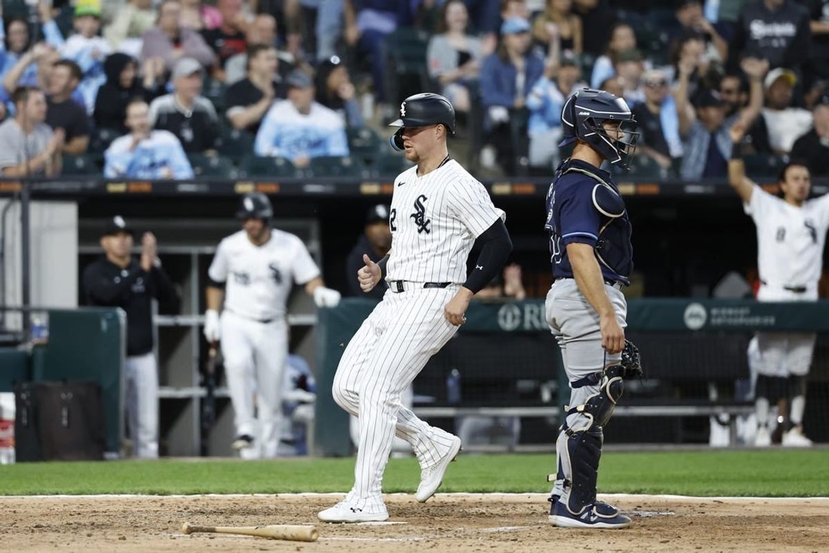 Apr 27, 2024; Chicago, Illinois, USA; Chicago White Sox first baseman Gavin Sheets (32) scores against the Tampa Bay Rays during the fifth inning at Guaranteed Rate Field.