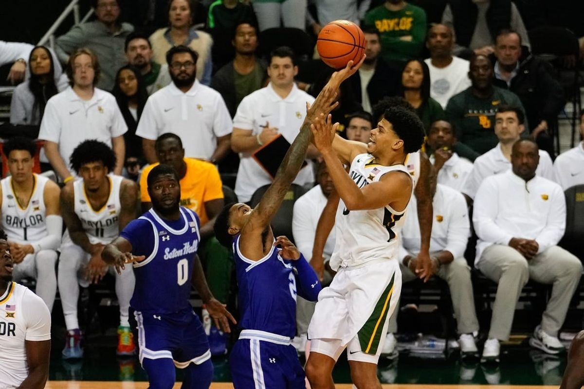 Dec 5, 2023; Waco, Texas, USA; Baylor Bears guard RayJ Dennis (10) shoots and is fouled by Seton Hall Pirates guard Al-Amir Dawes (2) during the second half at Ferrell Center.
