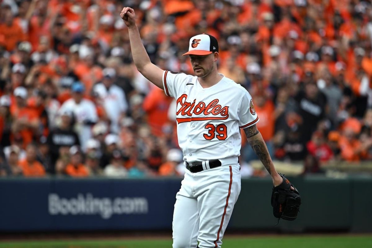 Oct 7, 2023; Baltimore, Maryland, USA; Baltimore Orioles starting pitcher Kyle Bradish (39) reacts after the last out of the top of the first inning was recorded against the Texas Rangers during game one of the ALDS for the 2023 MLB playoffs at Oriole Park at Camden Yards.