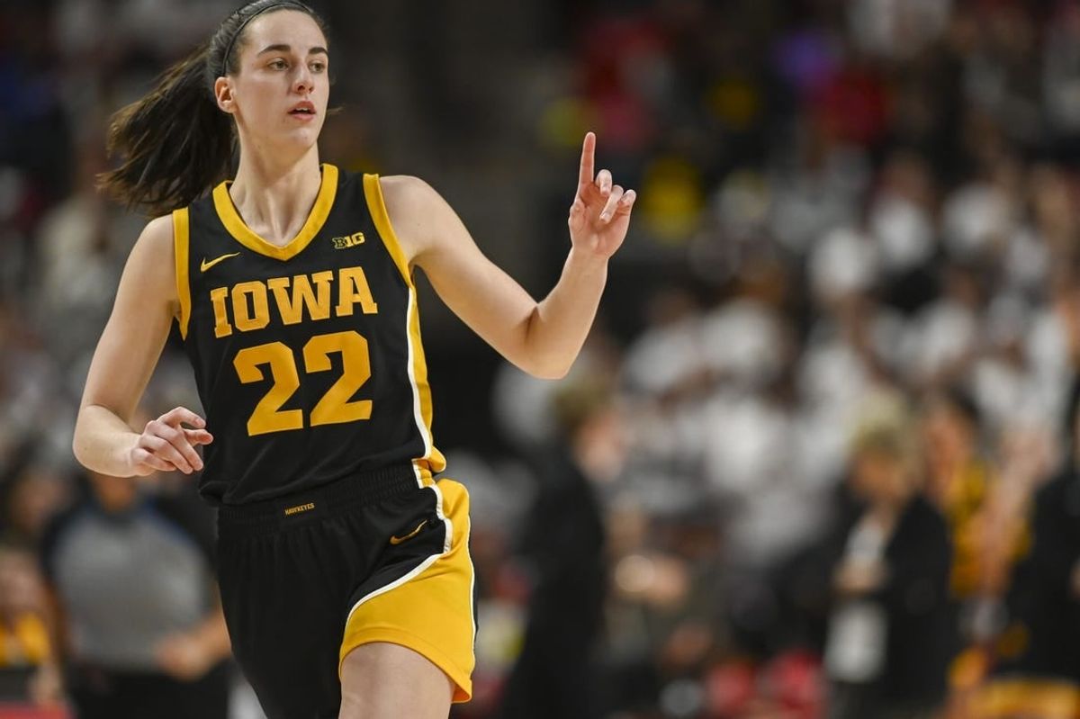 Feb 3, 2024; College Park, Maryland, USA;  Iowa Hawkeyes guard Caitlin Clark (22) reacts after making a three point basket during the second half against the Maryland Terrapins at Xfinity Center.
